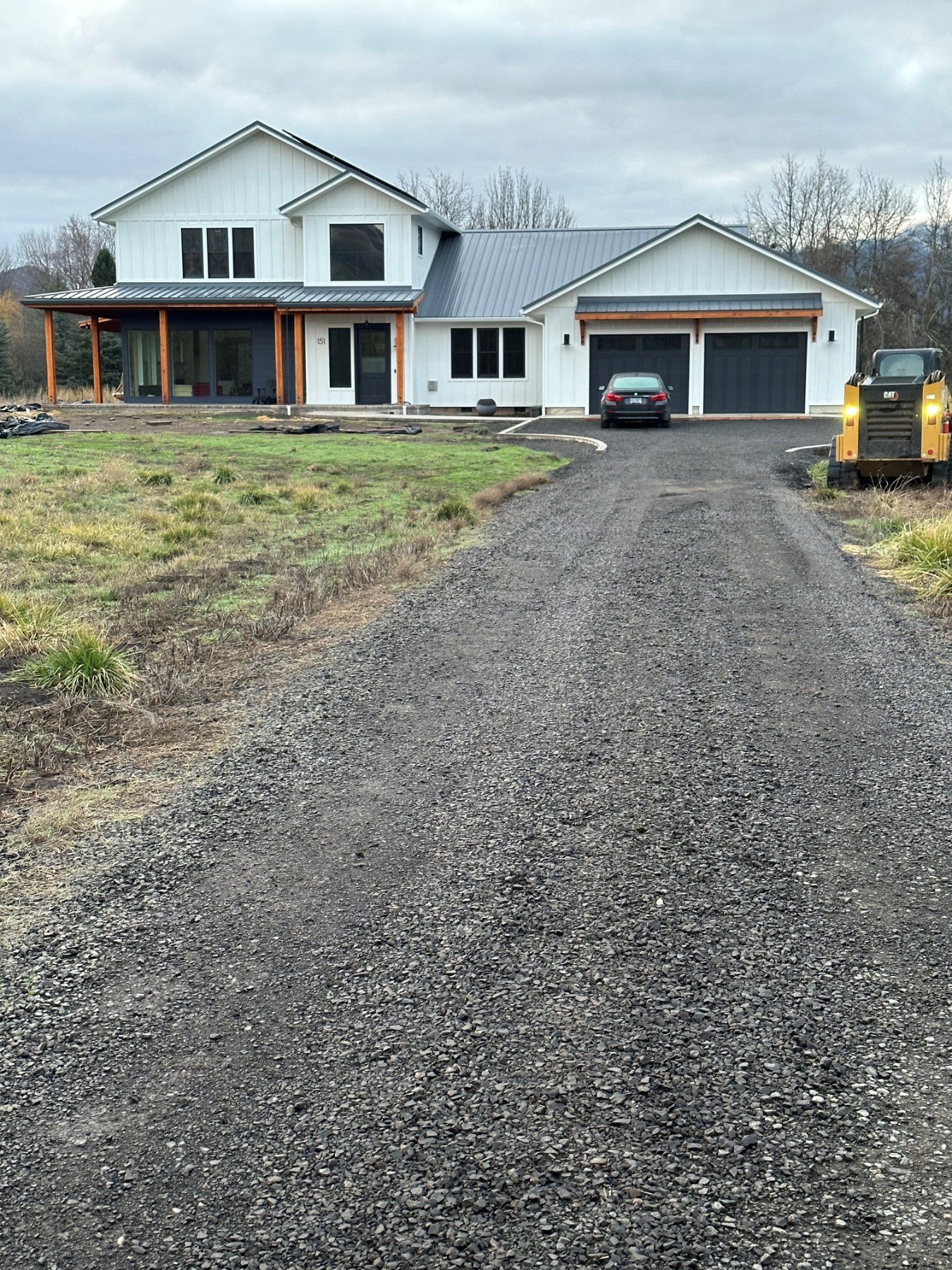 Driveway grading and drainage slope preparation by Musser Sealcoat and Paving Inc.