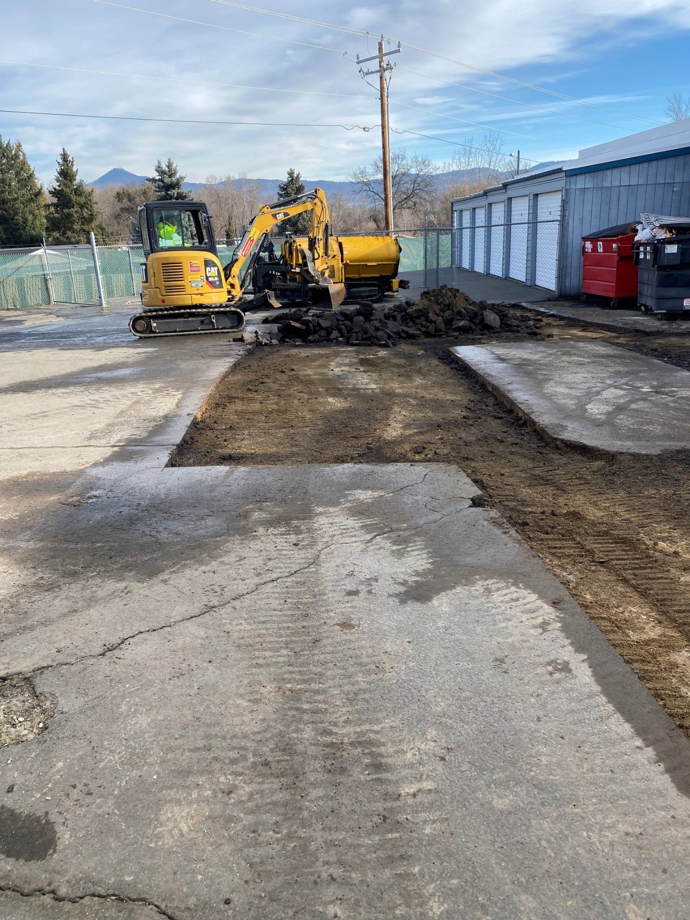 Excavated asphalt patching and repair area by Musser Sealcoat and Paving Inc.